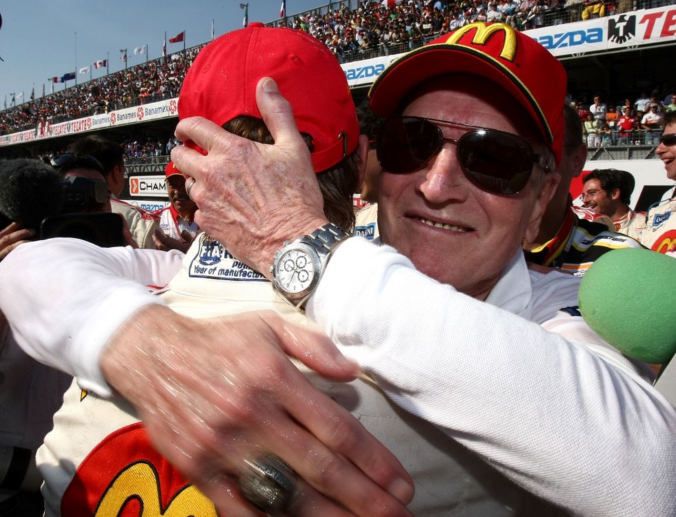 mexico city november 11 sebastien bourdais driver of the 1 mcdonalds newman haas lanigan racing panoz dp 01 celebrates with team owner paul newman after winning the champ car world series grand premio tecate on november 11, 2007 at autodromo hermonos rodriguez in mexico city, mexico photo by jonathan ferreygetty images