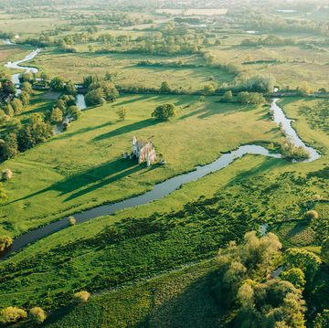 an aerial sunset view of the newark priory ruins, surrey stock photo