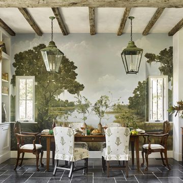 a serene mural of low country marshlandand reclaimed white oak beams accentuate lofty ceilings