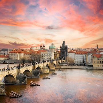 prague sunset, capital city of the czech republic, is bisected by the vltava river europe eu